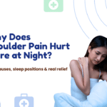 Person experiencing shoulder pain at night while lying in bed